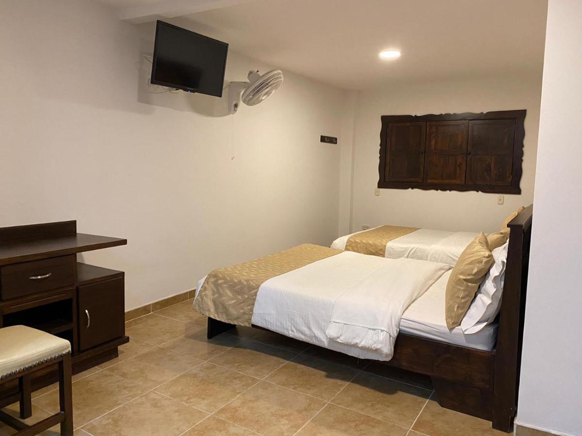 Casa Hotel Las Orquideas ซีร์กาเซีย ภายนอก รูปภาพ