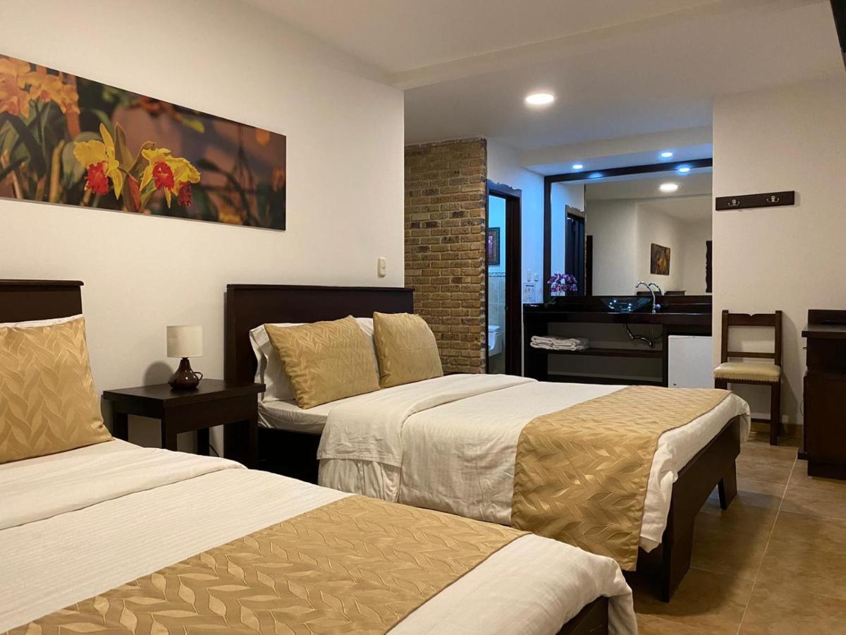Casa Hotel Las Orquideas ซีร์กาเซีย ภายนอก รูปภาพ