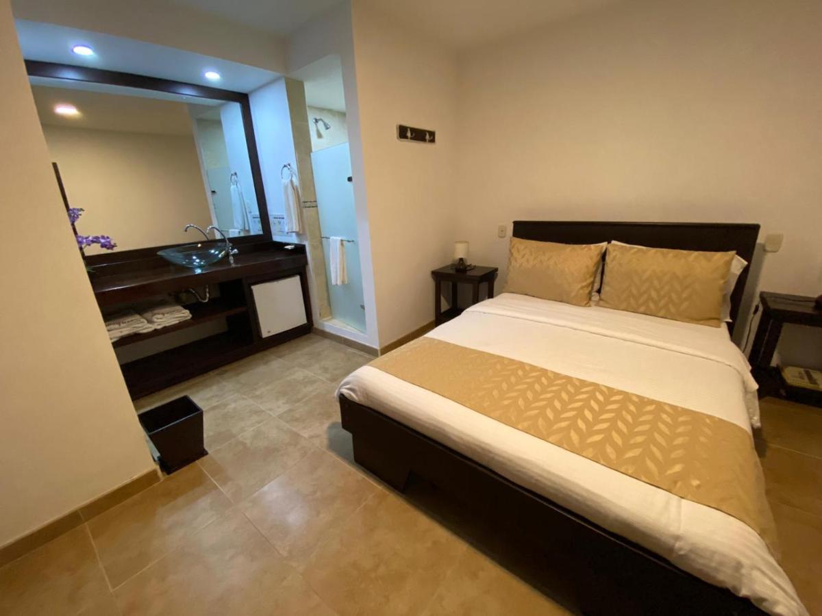 Casa Hotel Las Orquideas ซีร์กาเซีย ภายนอก รูปภาพ